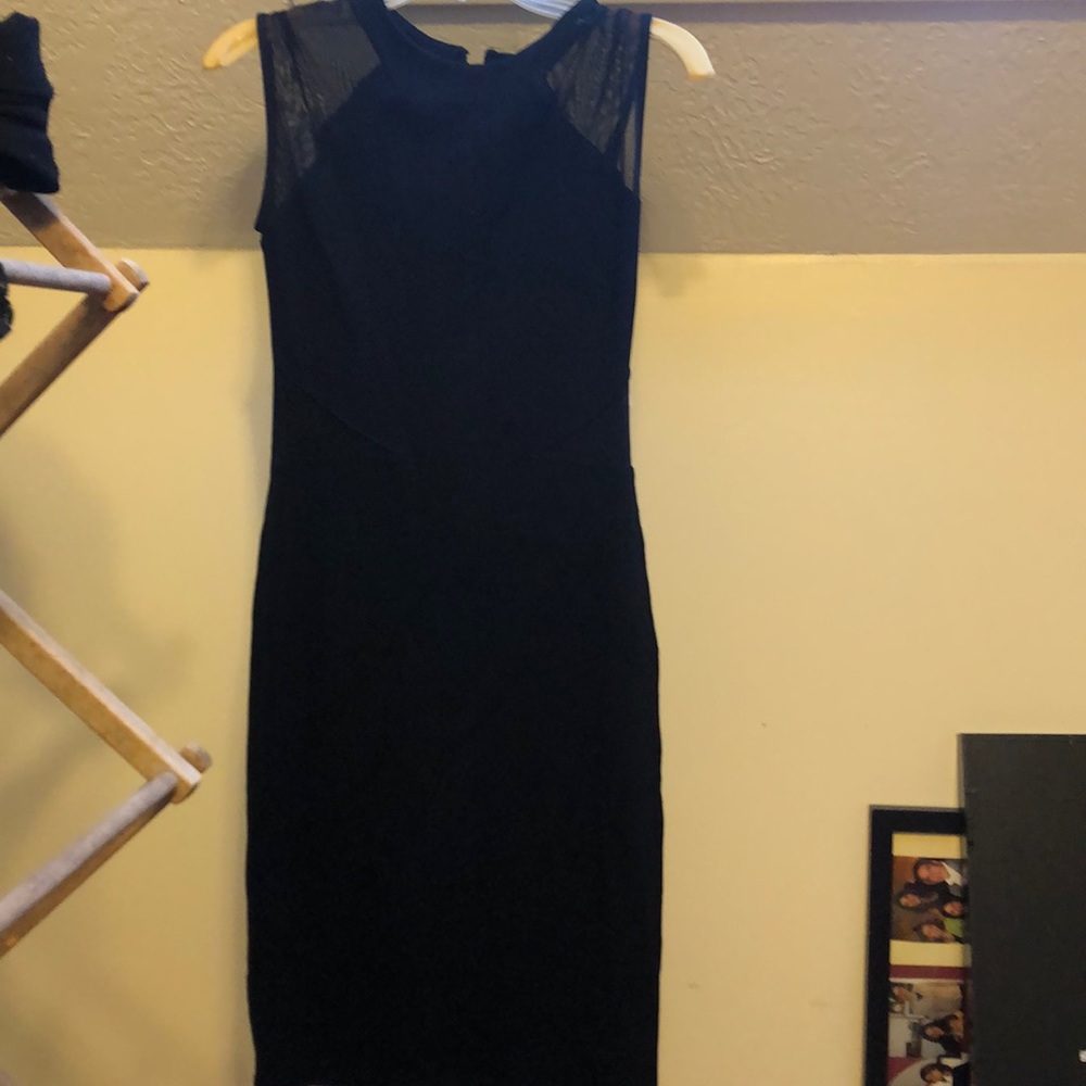 Black, tight, midi length dress